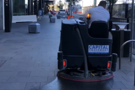 CS7010 Sweeper-Scrubber Image of Nilfisk CS7010 cleaning public restaurant precinct