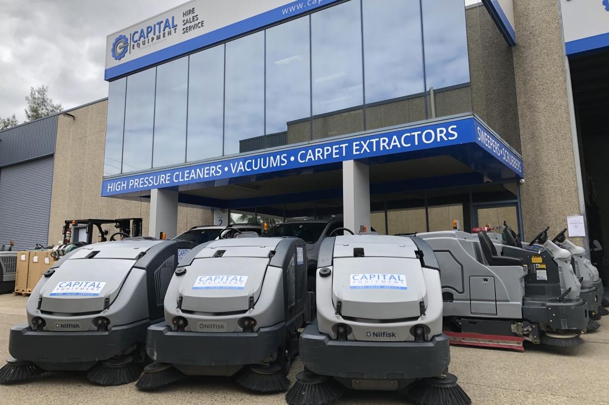 Image of 3 Nilfisk CS7010 Sweeper Scrubbers outside Capital Equipment's Wetherill Park Workshop