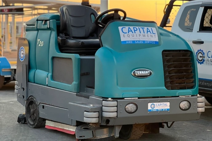 T20 scrubber for airport terminal cleaning Tennant T20 scrubber used for terminal floor cleaning in busy airport environments