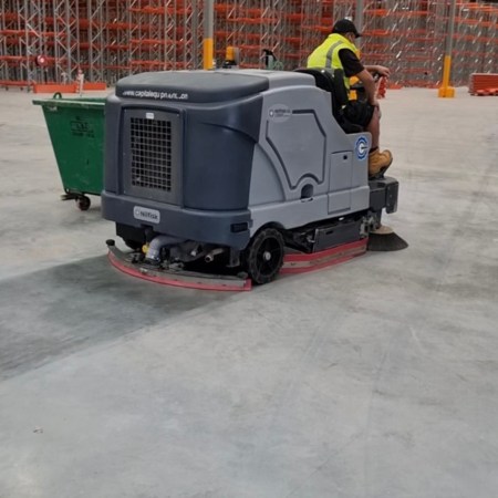 Nilfisk SC8000 Industrial Scrubber-Sweeper Cleaning Warehouse